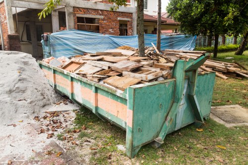 Professional furniture clearance team removing sofas